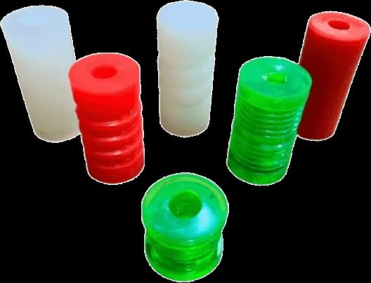 Ribbed and plain textile loom buffers in red, green and white